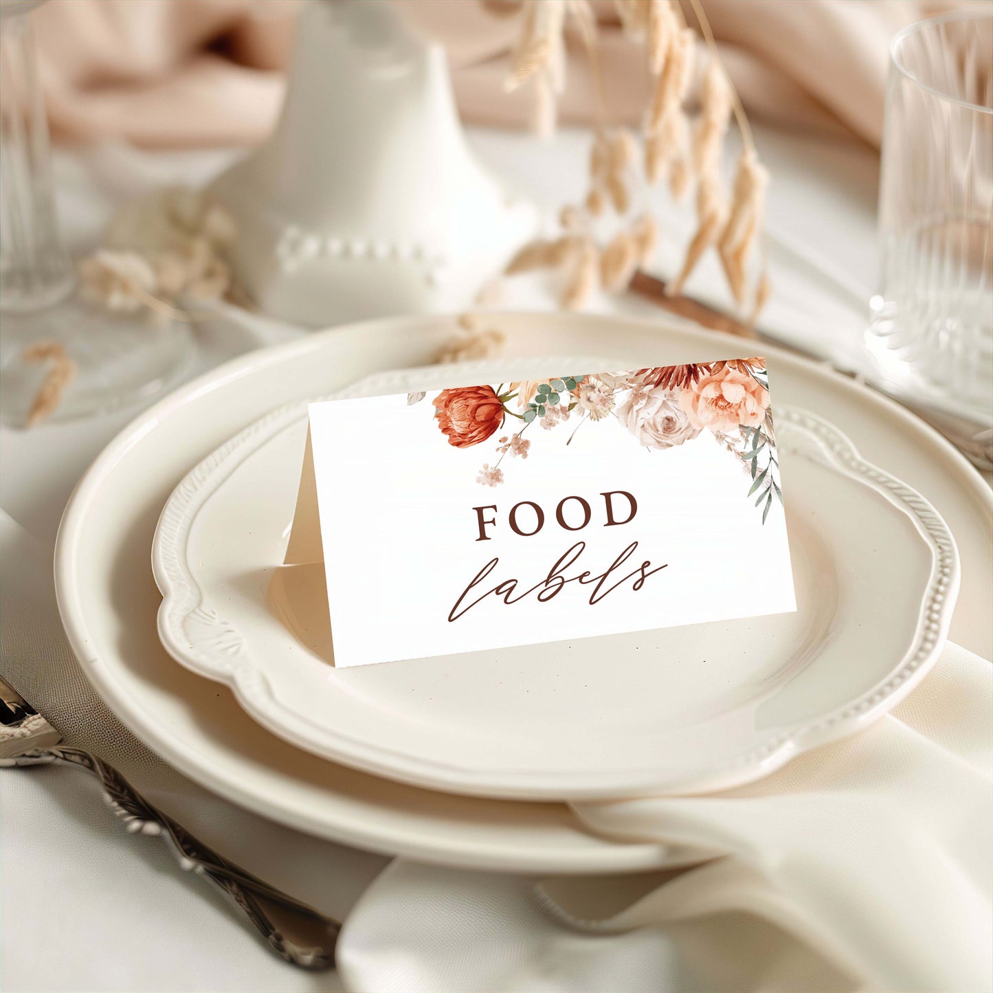 a white plate topped with a white table cloth