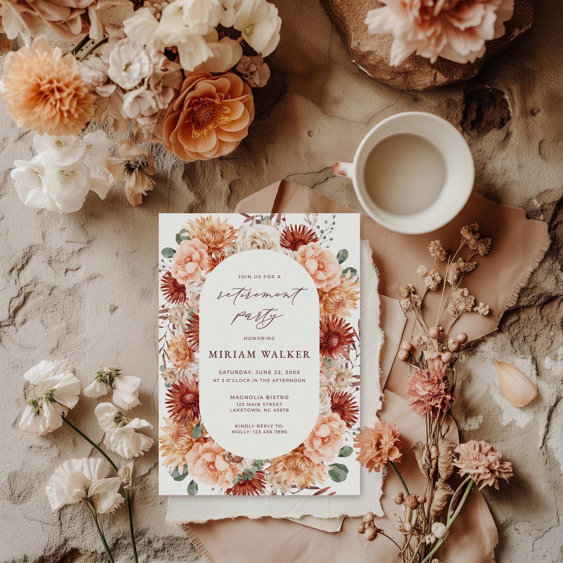 a wedding suite with flowers and a cup of coffee