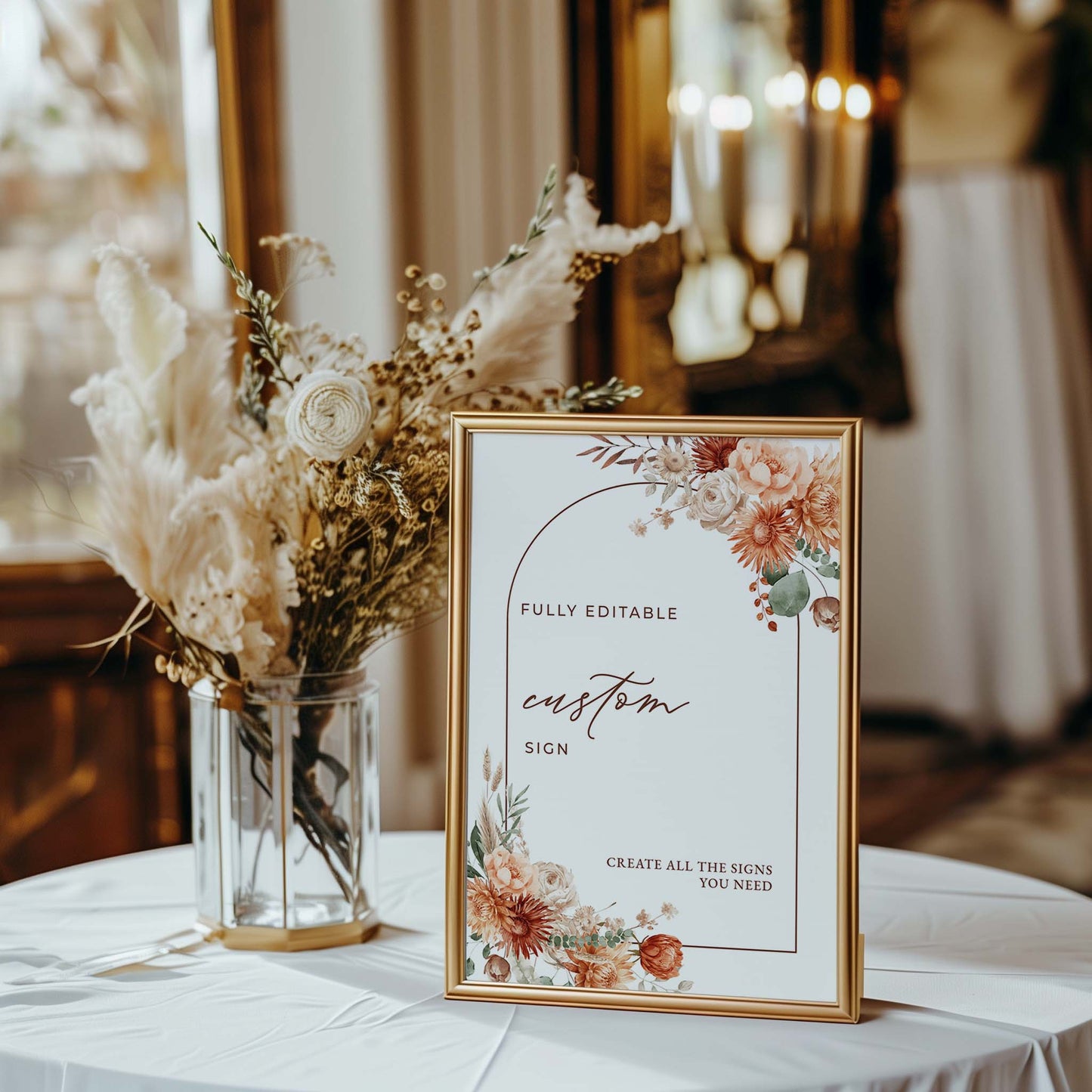 a table topped with a vase filled with flowers