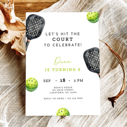 Black and neon green pickleball birthday invitation featuring a watercolor pickleball paddle and ball, modern sports typography, and a sixth birthday party theme.