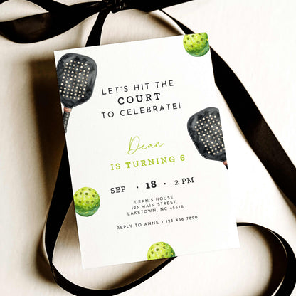 Black and neon green pickleball birthday invitation featuring a watercolor pickleball paddle and ball, modern sports typography, and a sixth birthday party theme.