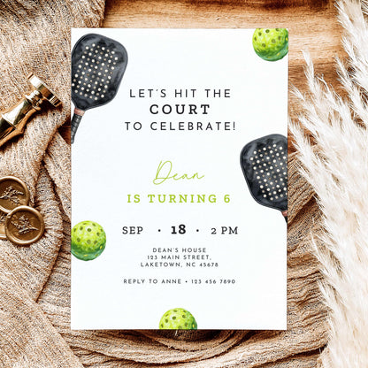 Black and neon green pickleball birthday invitation featuring a watercolor pickleball paddle and ball, modern sports typography, and a sixth birthday party theme.