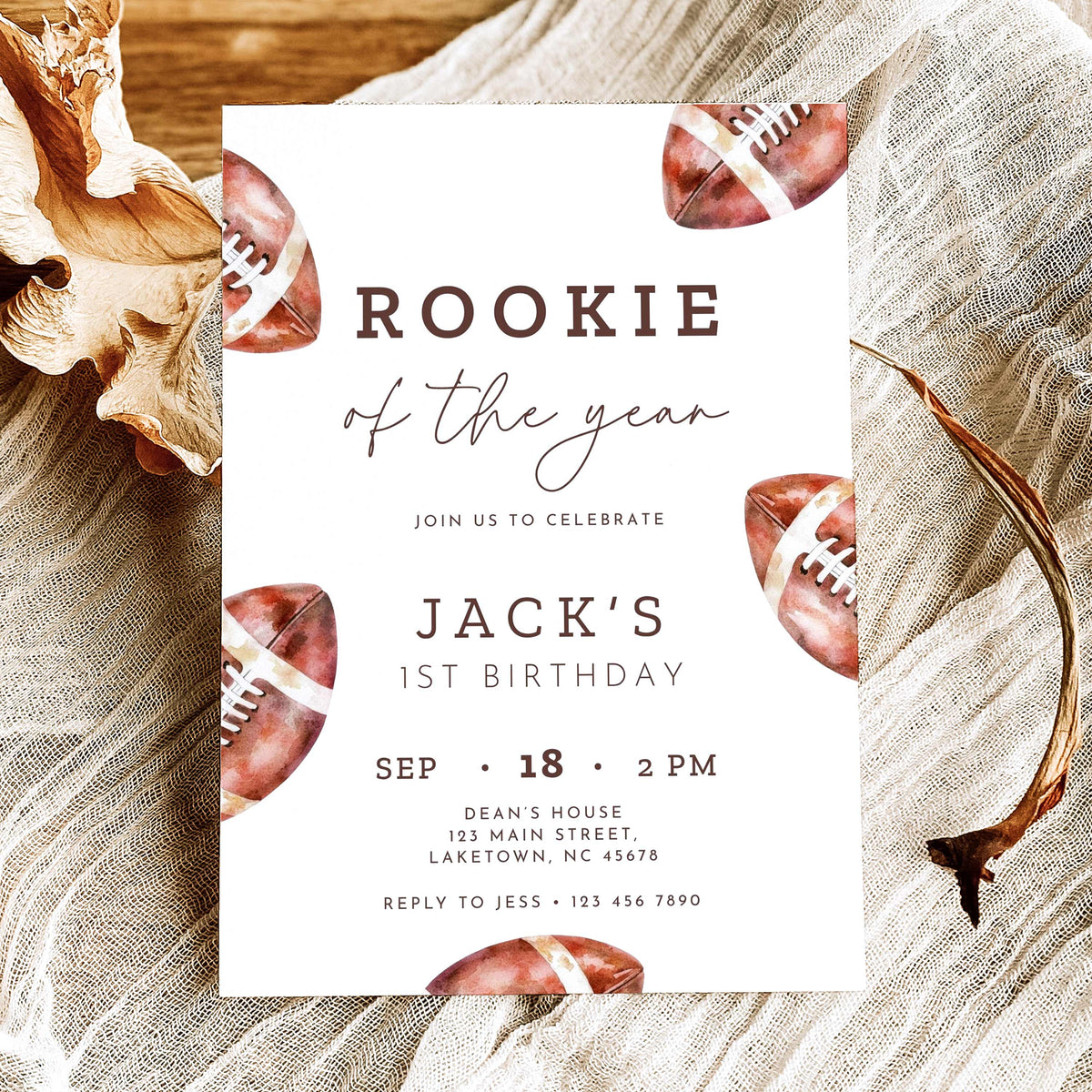 Rookie of the Year football first birthday invitation featuring vintage watercolor brown footballs, elegant script typography, and personalized birthday party details on a white background.