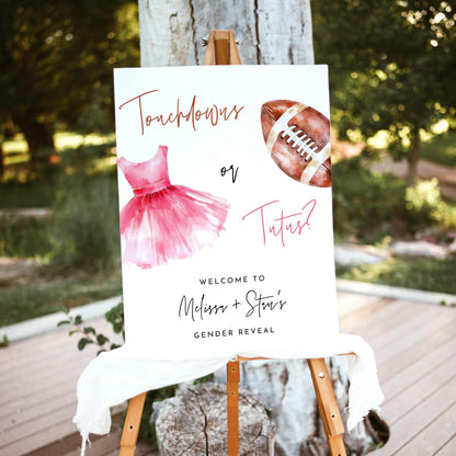 Touchdowns or Tutus gender reveal welcome sign featuring a watercolor brown football, pink ballet tutu, handwritten lettering, and personalized party details on a white background.