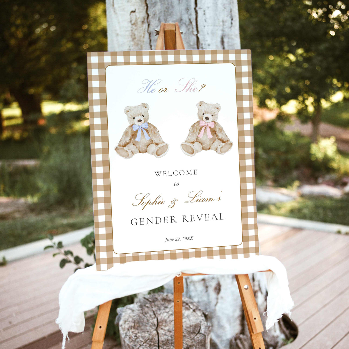 Vintage teddy bear gender reveal welcome sign with blue and pink bows and beige gingham